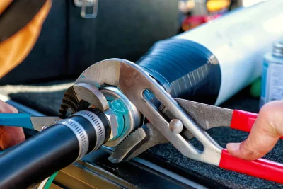 Pipe repair service using professional plumbing tools in Seminole, Florida
